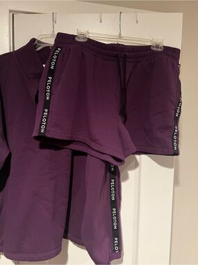 Peloton Women’s Deep Purple Athletic set. Shorts & sweatshirt Set.